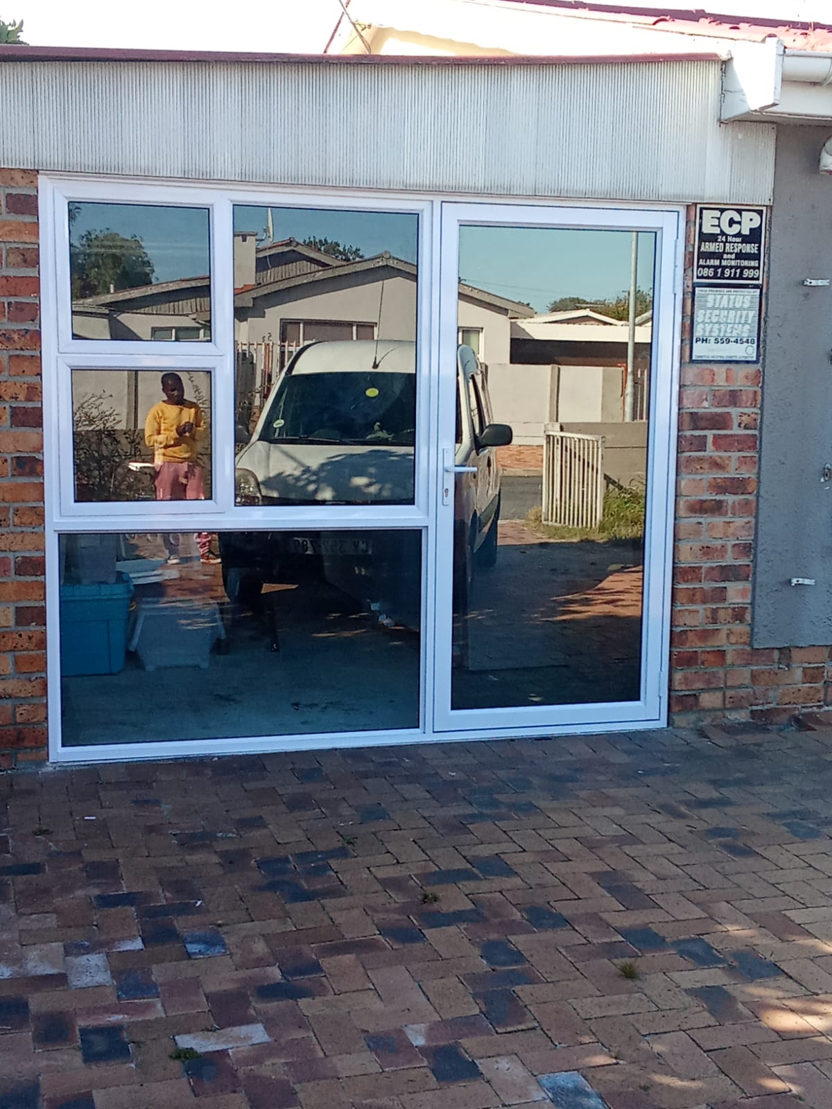 cozii glass and aluminium hinged door with sidelight